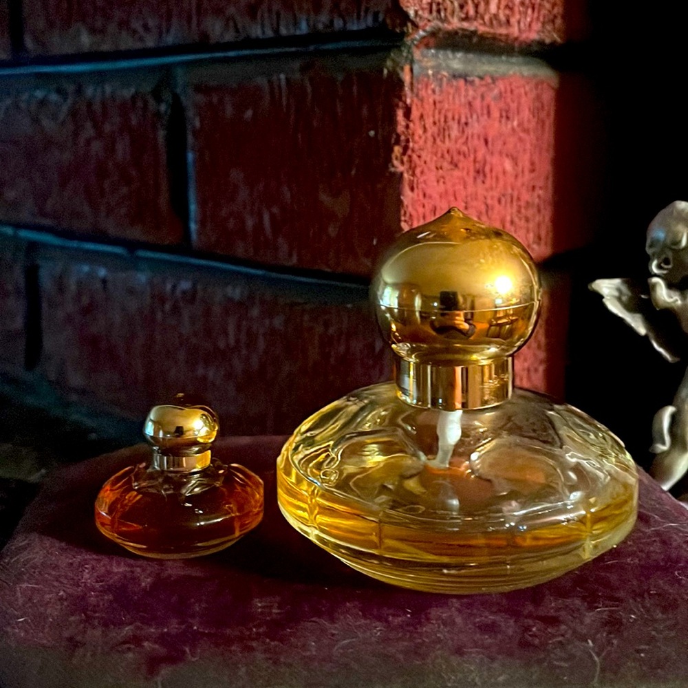 Vintage Eau de parfum spray 1.7 fl oz and miniature parfum